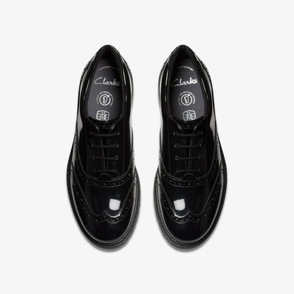 Loxham Brogue Youth Black Patent | Clarks online